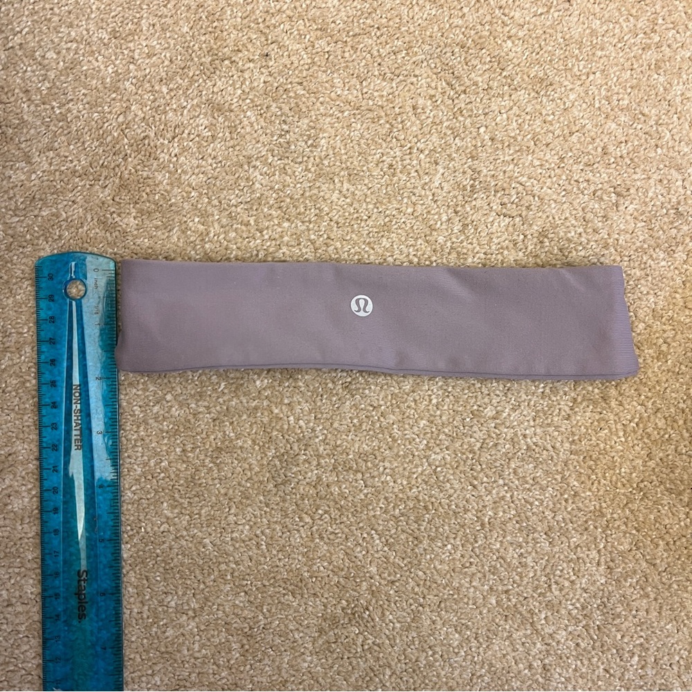Lululemon flyaway tamer headband in lavender grey color. Like new.